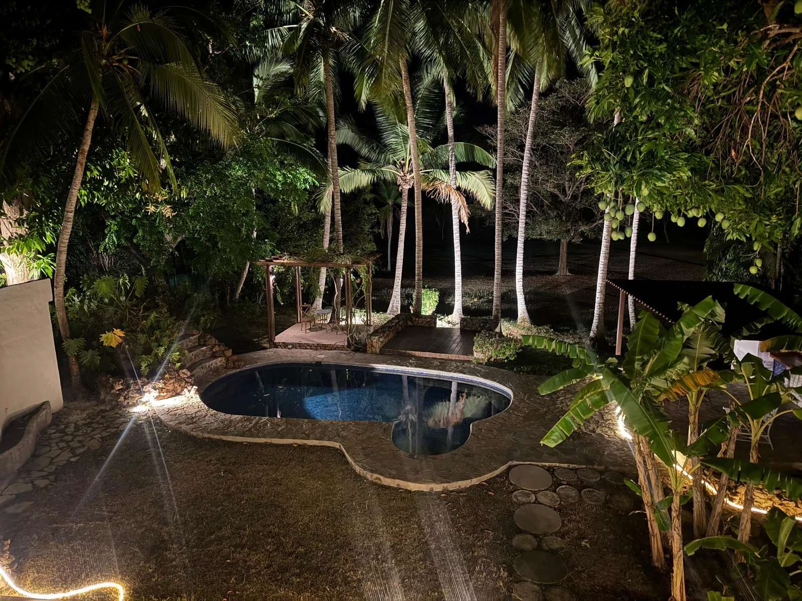 The pool at night — Spanish Colonial home for sale at Coronado Golf Club, Panama