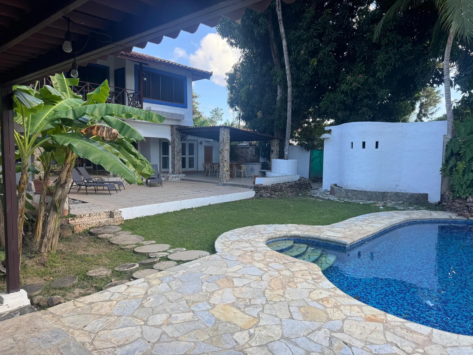 Pool from the garden path — Spanish Colonial home for sale at Coronado Golf Club, Panama