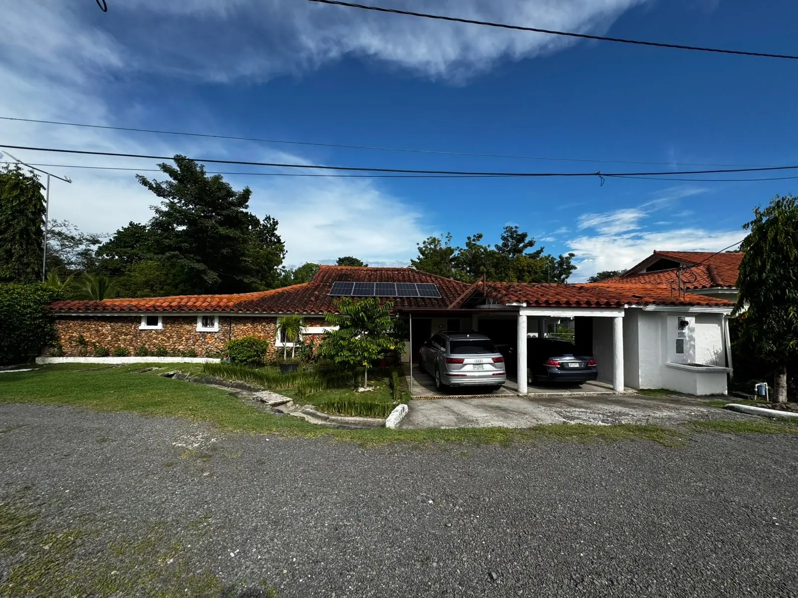 The house from the driveway — lakeside home for sale at Club Ecuestre de Coronado, Panama