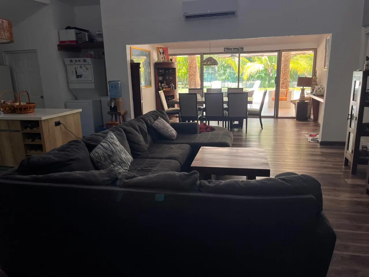 Living area opening to the garden — lakeside home for sale at Club Ecuestre de Coronado, Panama