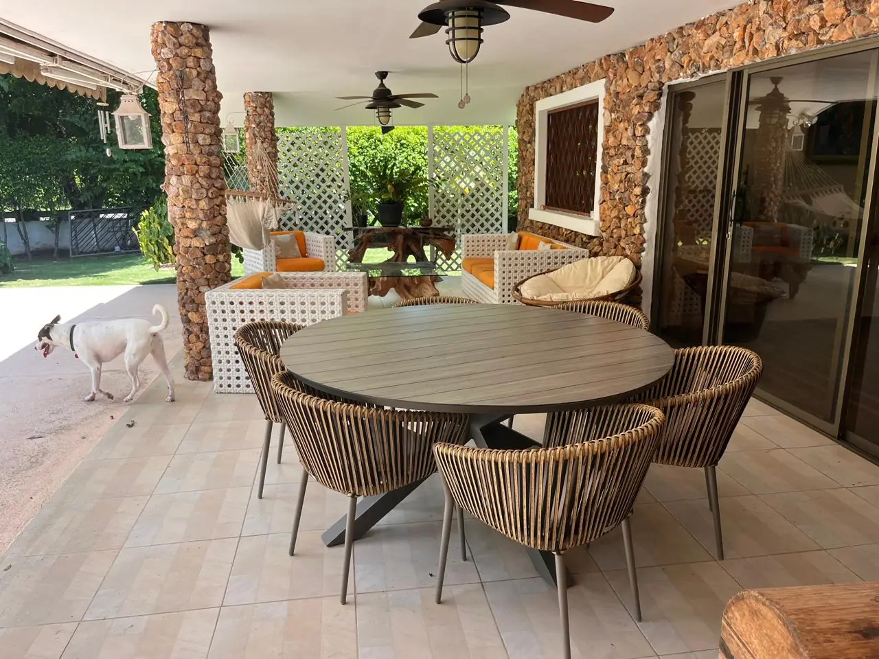 Dining on the covered terrace — lakeside home for sale at Club Ecuestre de Coronado, Panama