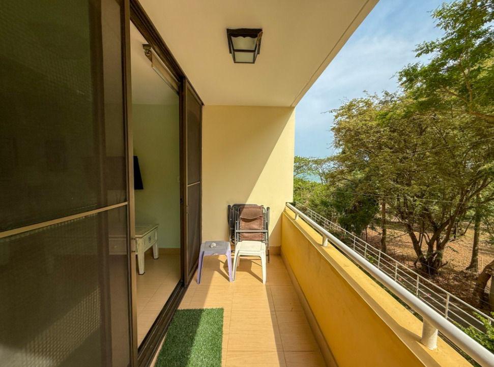 Private balcony with green canopy views