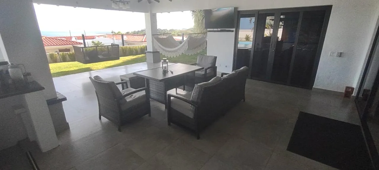 Covered patio looking out to the sea — ocean-view home for sale in Terrazas de Vista Mar, San Carlos, Panama